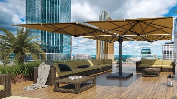 Shade7 Galaxy Quattro umbrella in carbon over a rooftop lounge